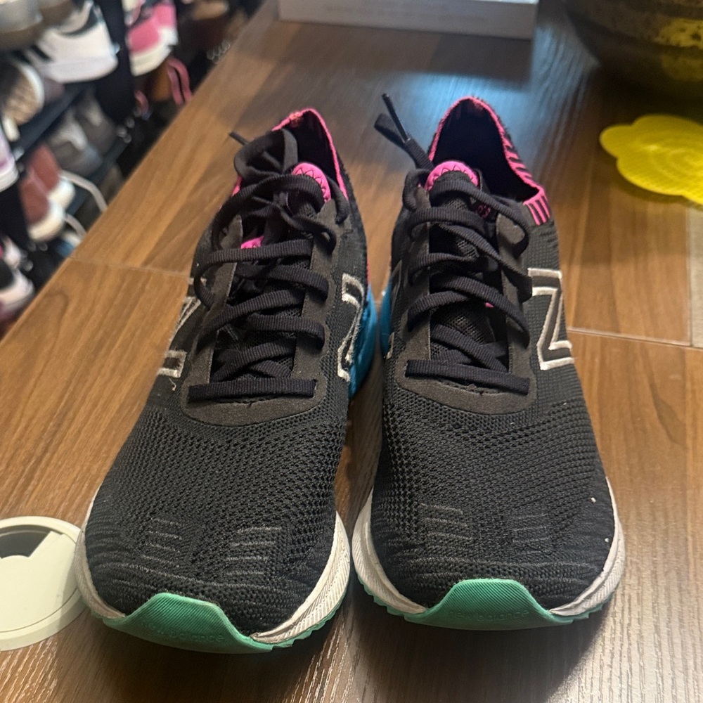 New Balance Black Sneakers with Pink and Teal Highlights